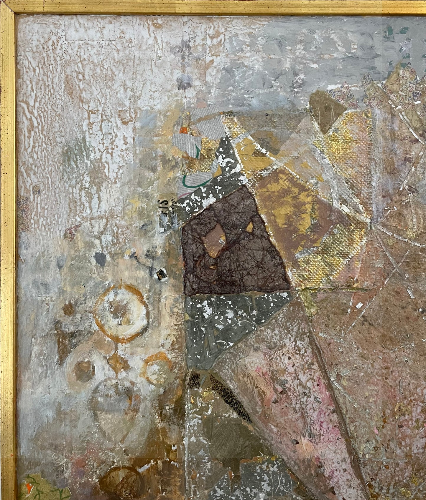Abstract artwork with textured surface and gold frame
