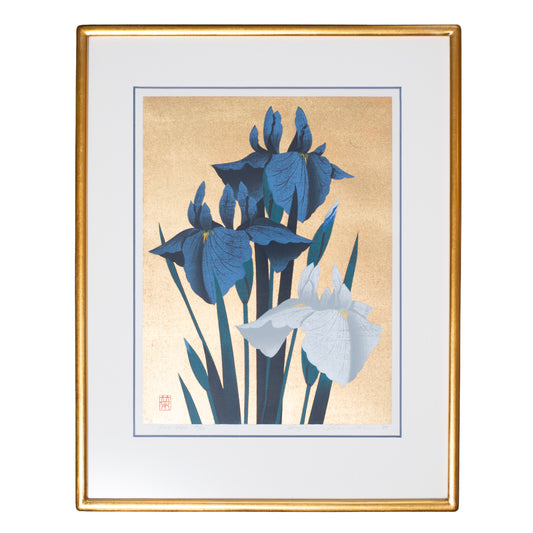 Framed artwork of blue and white flowers on a beige background