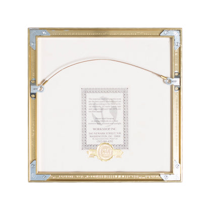 Decorative gold and silver frame with a certificate inside on a white background