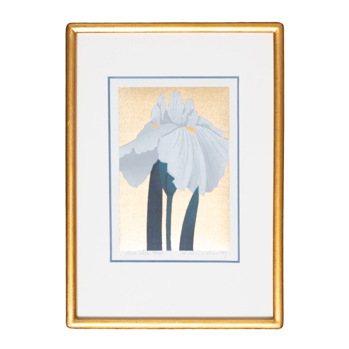 Framed artwork of a white flower with a gold frame on a white background