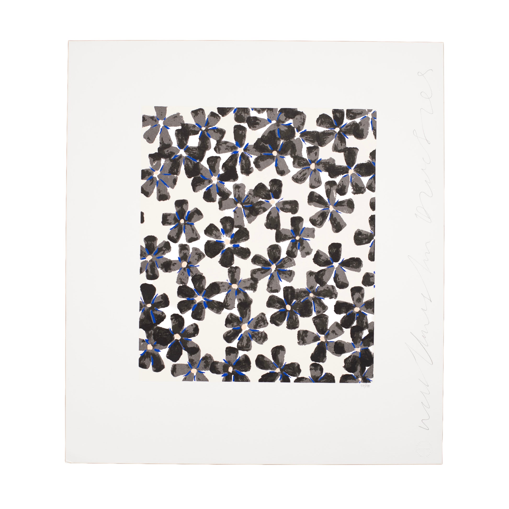 Patterned paper with black and blue floral design on a white background