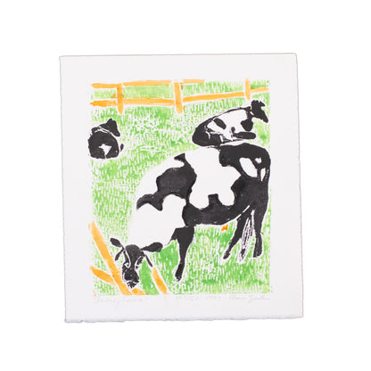 Framed print of cows. 
